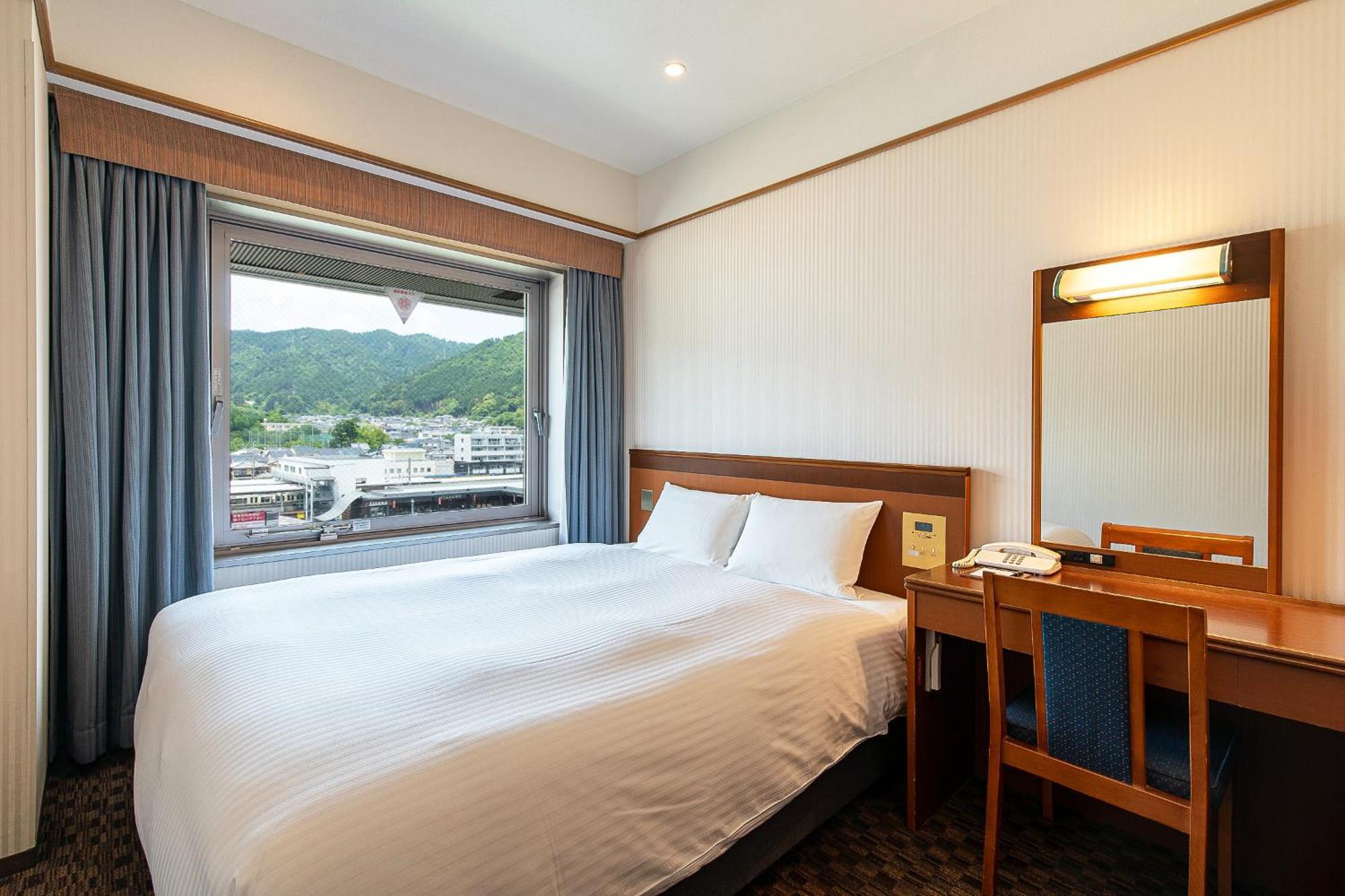 Kyoto Yamashina Hotel Sanraku Rum bild